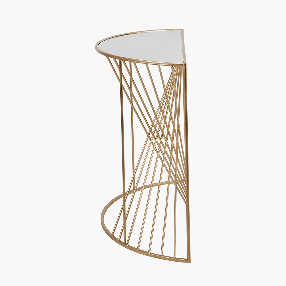 An Elegant Half Moon shape, perfect for hallways, entryways, or living rooms. Gold Metal Frame with Twisted Detailing with tempered glass top. Available at www.nobleandnook.co.uk