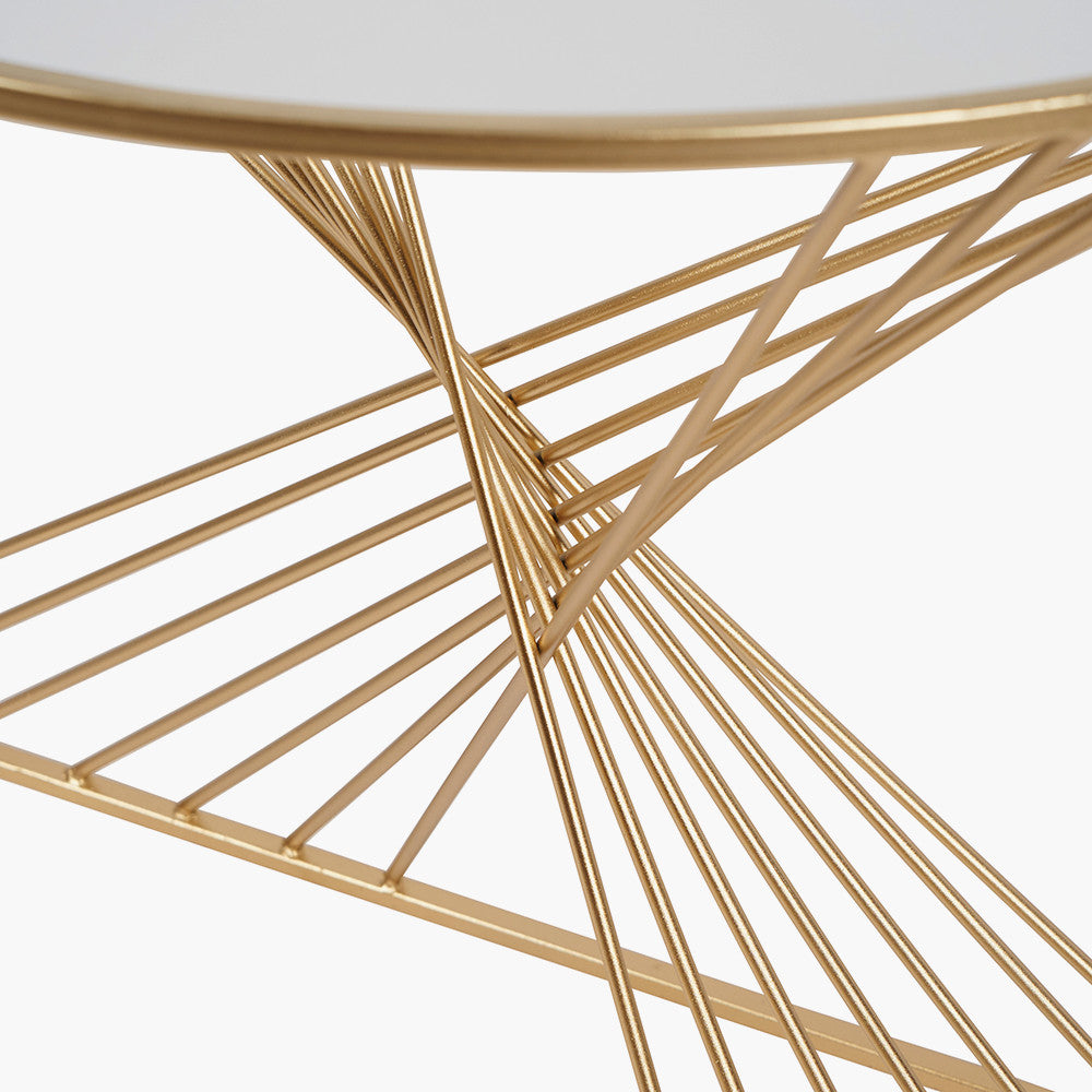 An Elegant Half Moon shape, perfect for hallways, entryways, or living rooms. Gold Metal Frame with Twisted Detailing with tempered glass top. Available at www.nobleandnook.co.uk