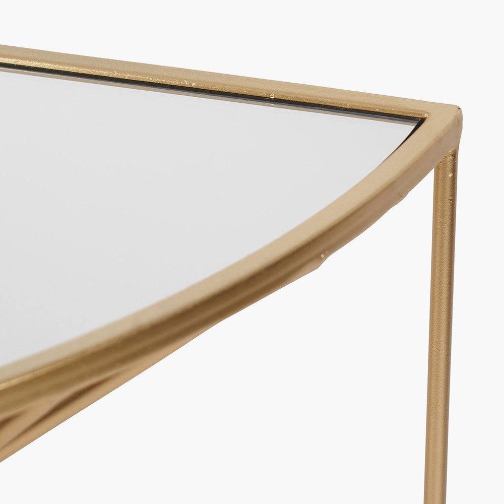 An Elegant Half Moon shape, perfect for hallways, entryways, or living rooms. Gold Metal Frame with Twisted Detailing with tempered glass top. Available at www.nobleandnook.co.uk