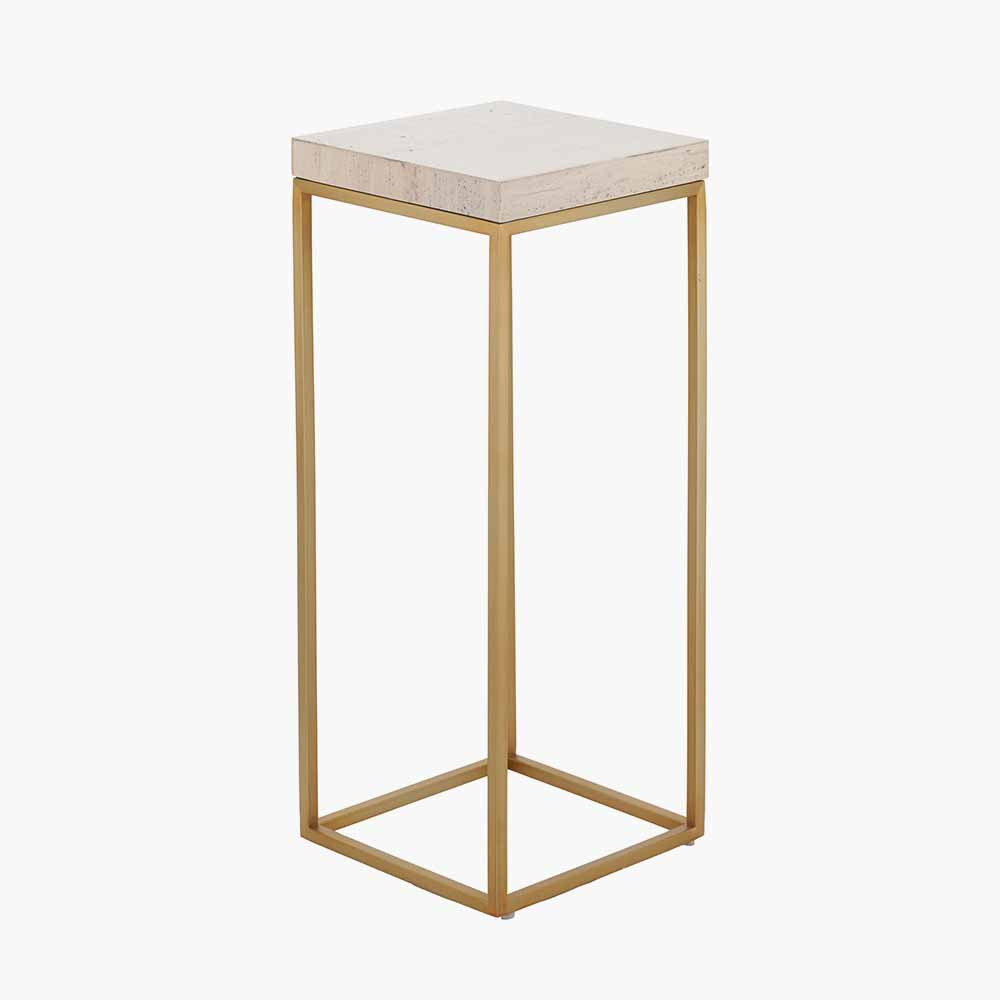 Shop the Madison tall side table, boasting warm burnished gold metal legs and a sophisticated beige granite top, this contemporary piece adds a touch of luxury to any room. Shop online now at www.nobleandnook.co.uk