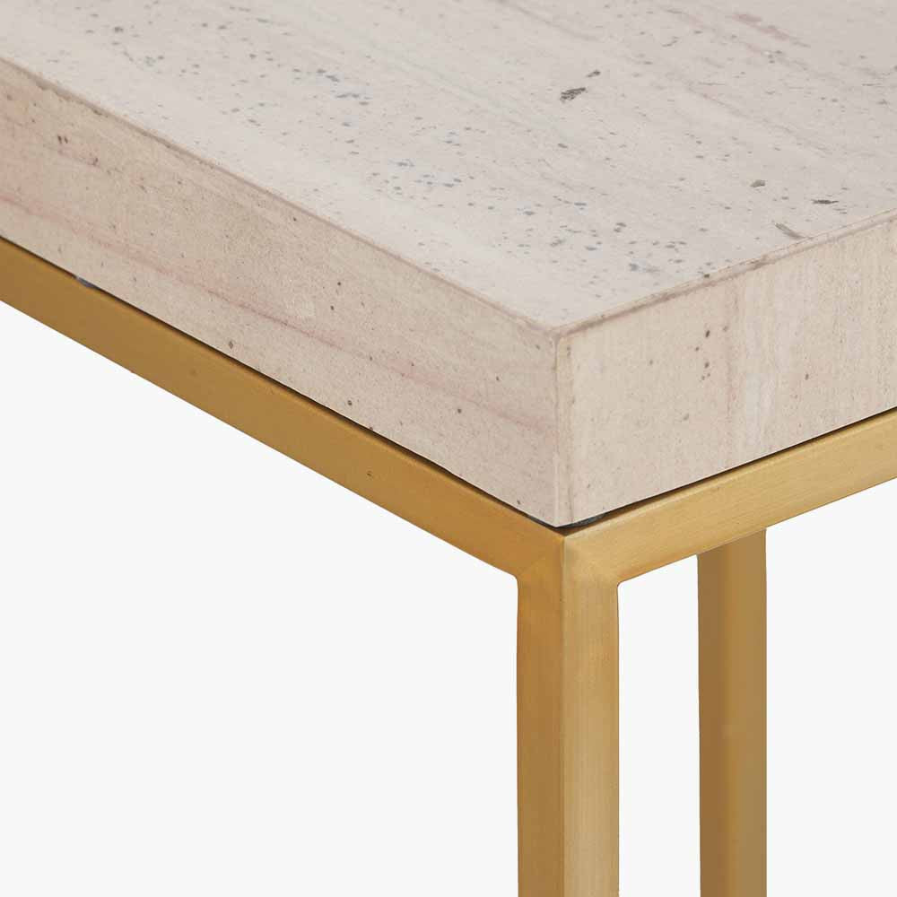 Shop the Madison tall side table, boasting warm burnished gold metal legs and a sophisticated beige granite top, this contemporary piece adds a touch of luxury to any room. Shop online now at www.nobleandnook.co.uk
