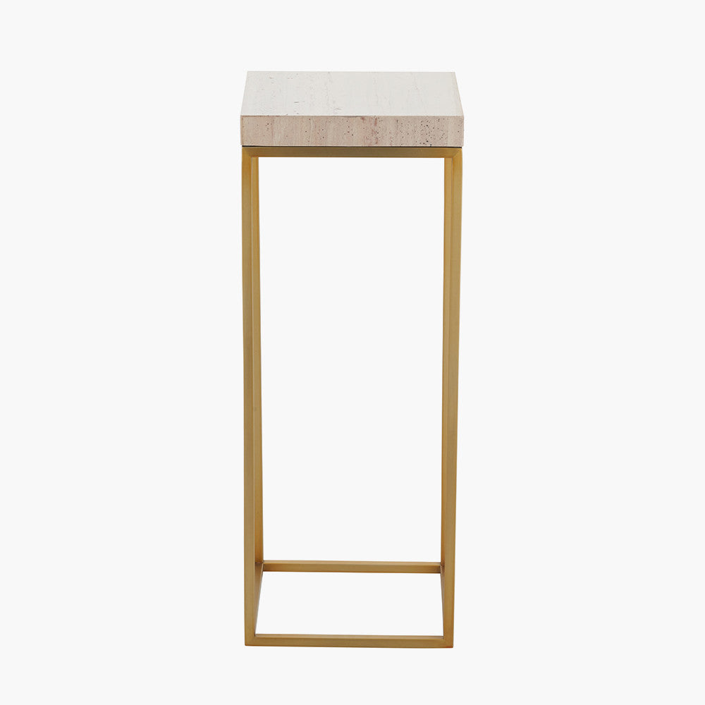 Shop the Madison tall side table, boasting warm burnished gold metal legs and a sophisticated beige granite top, this contemporary piece adds a touch of luxury to any room. Shop online now at www.nobleandnook.co.uk