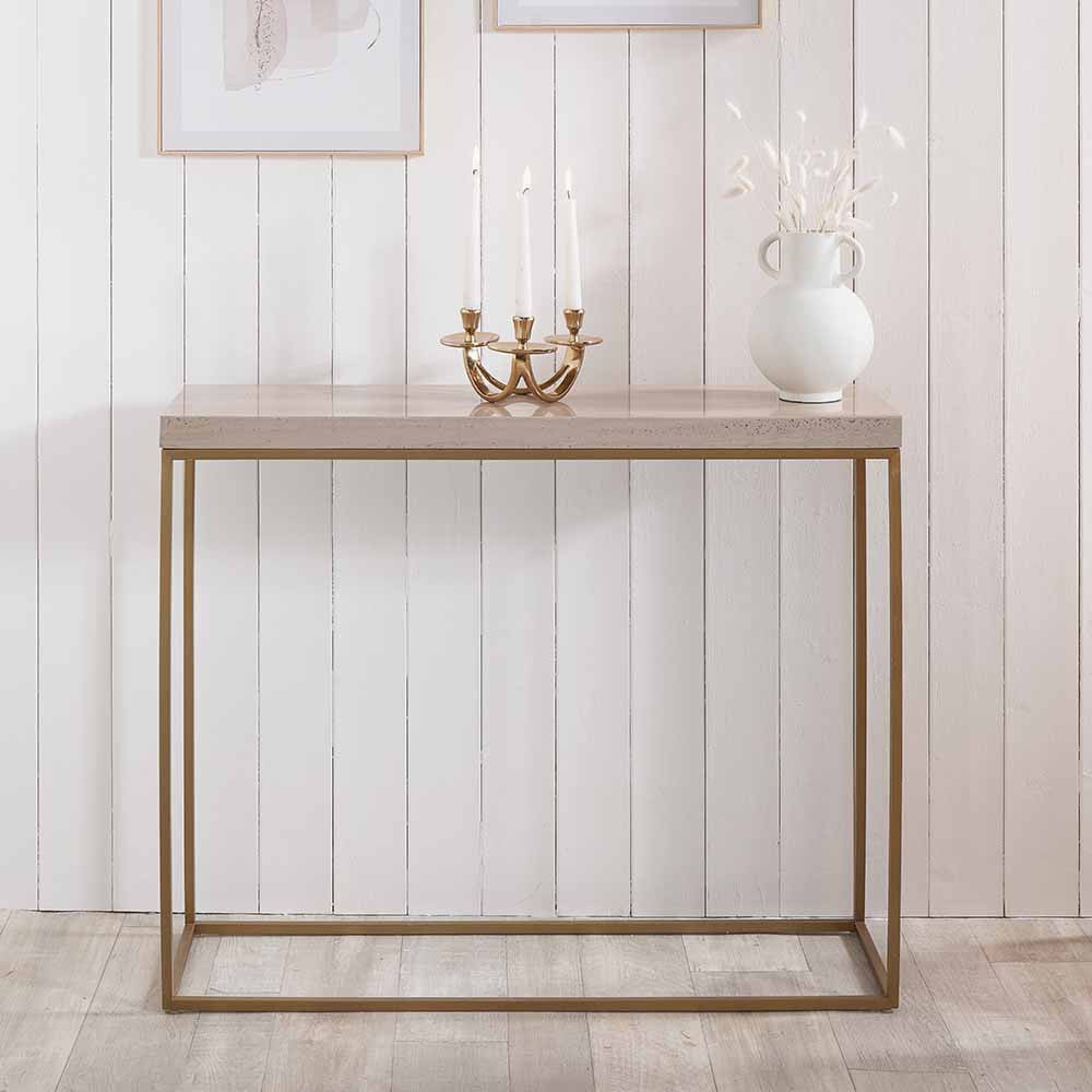 Shop the stunning Madison Beige Granite and Burnished Gold Metal Console Table is expertly crafted to be a sleek and modern addition to your home. Shop online now at www.nobleandnook.co.uk