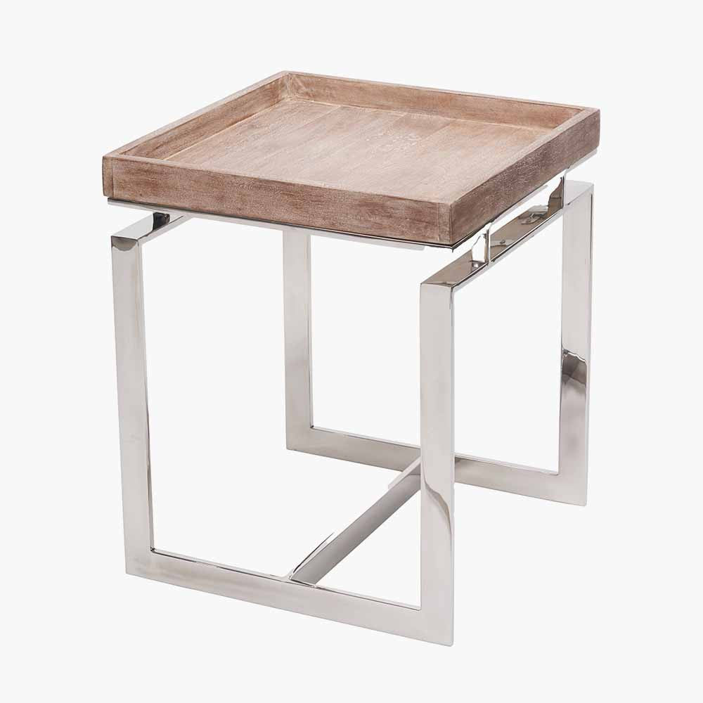 Shop the Evelyn Side Table, featuring a hand-finished antique mango wood top and a polished stainless steel frame. Dimensions W46xD46xH55cm. Shop online today at www.nobleandnook.co.uk