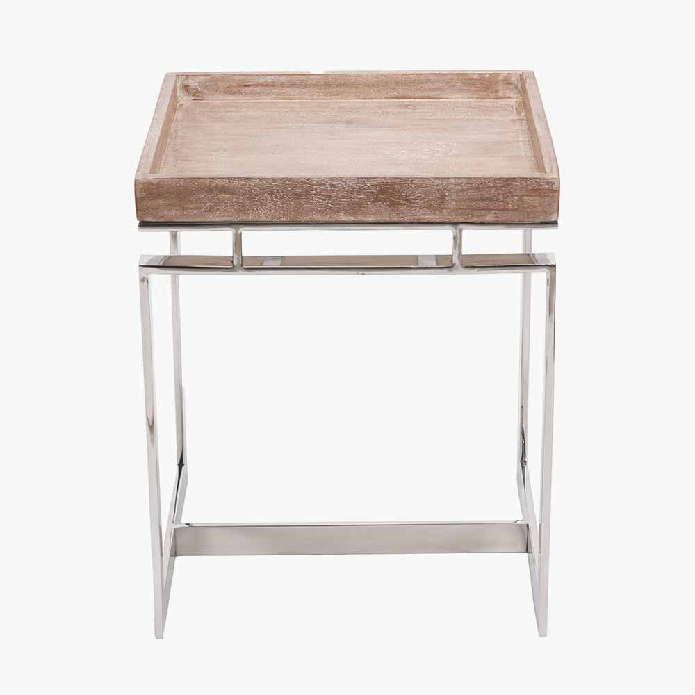 Shop the Evelyn Side Table, featuring a hand-finished antique mango wood top and a polished stainless steel frame. Dimensions W46xD46xH55cm. Shop online today at www.nobleandnook.co.uk