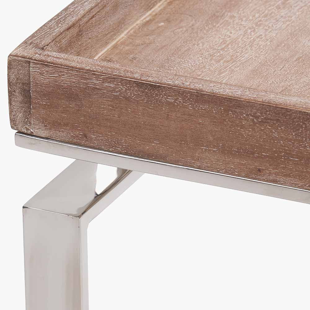 Shop the Evelyn Side Table, featuring a hand-finished antique mango wood top and a polished stainless steel frame. Dimensions W46xD46xH55cm. Shop online today at www.nobleandnook.co.uk