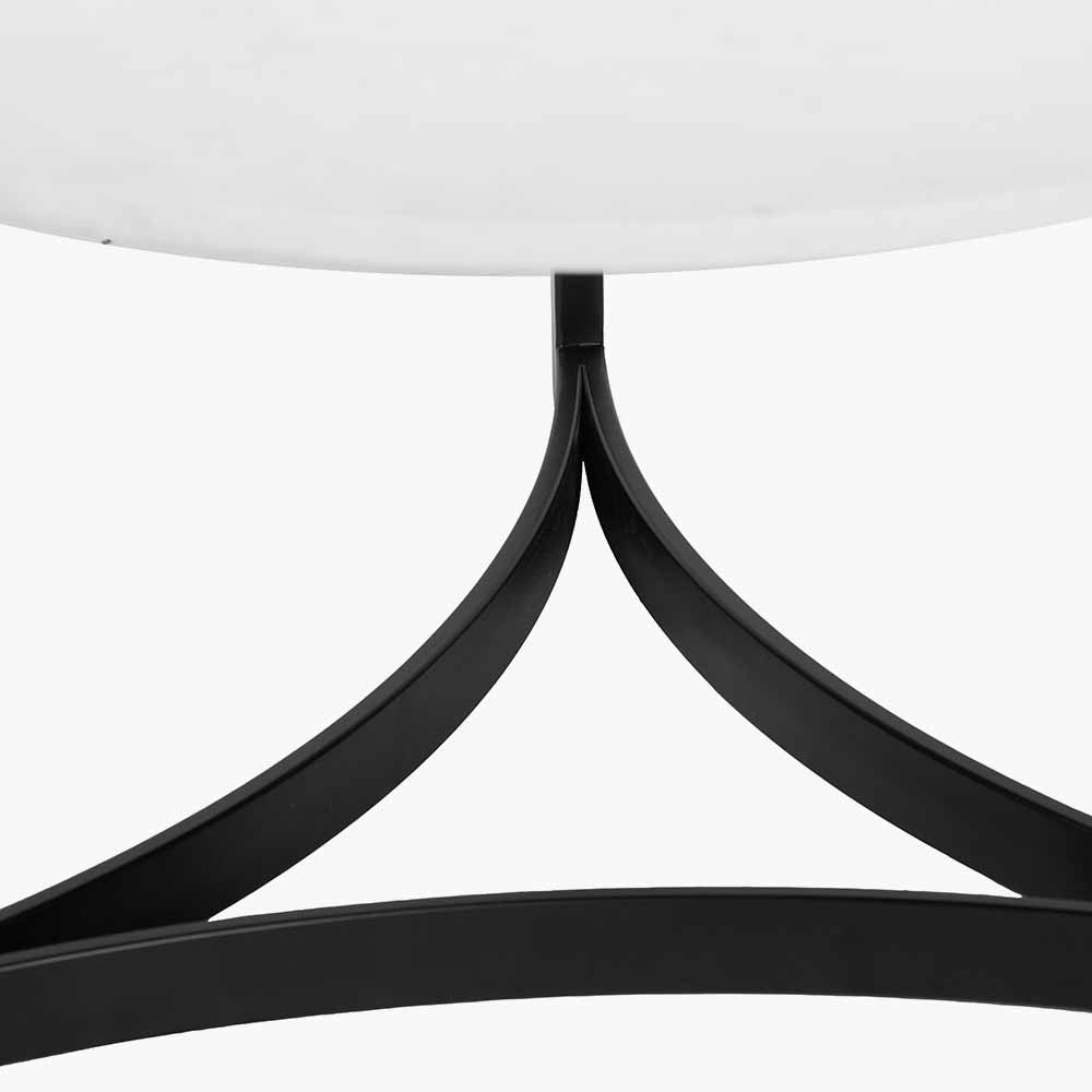 Shop the luxurious Hendrick White Marble & Black Metal Coffee Table featuring a sleek white marble top and curved black metal legs. Shop online now at www.nobleandnook.co.uk