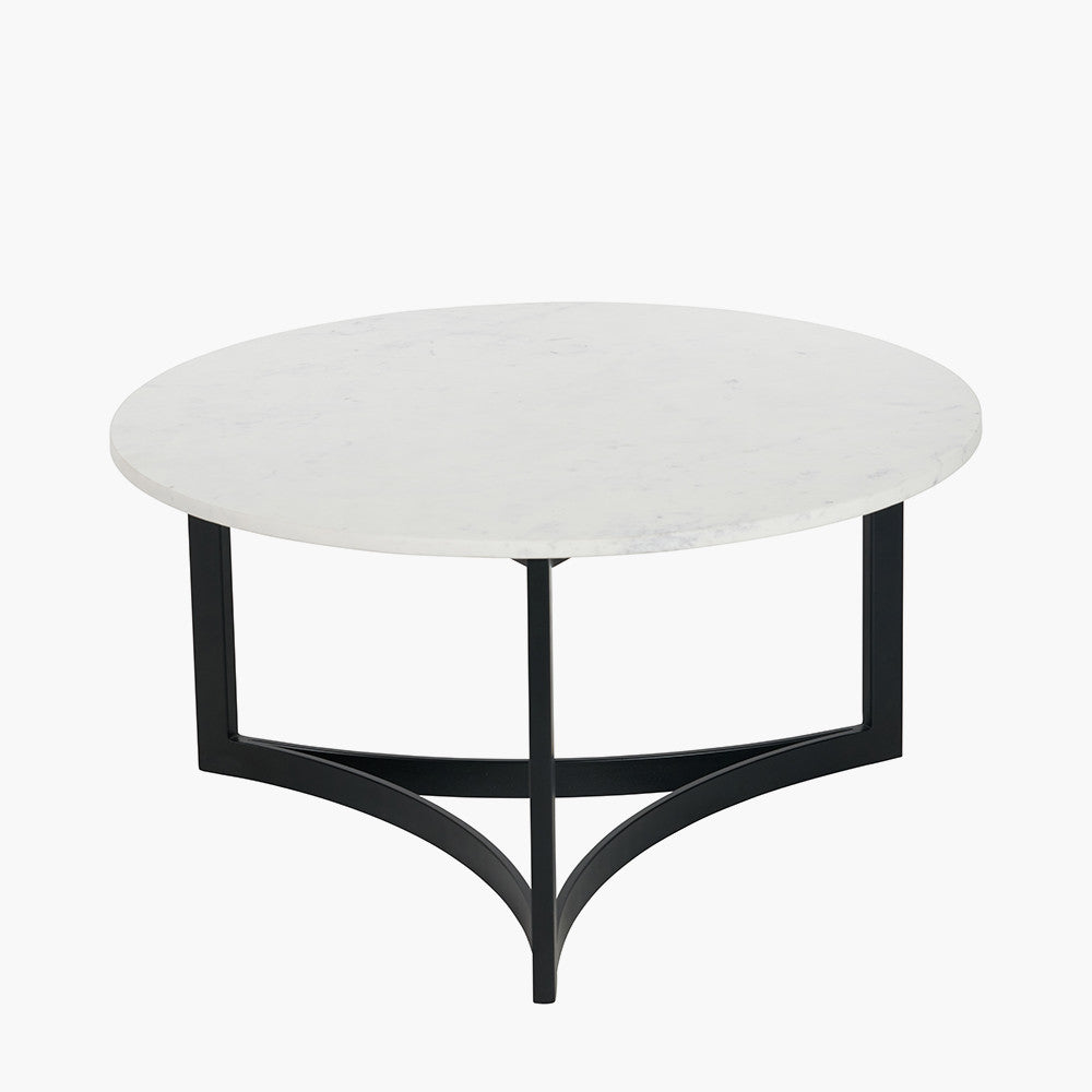 Shop the luxurious Hendrick White Marble & Black Metal Coffee Table featuring a sleek white marble top and curved black metal legs. Shop online now at www.nobleandnook.co.uk