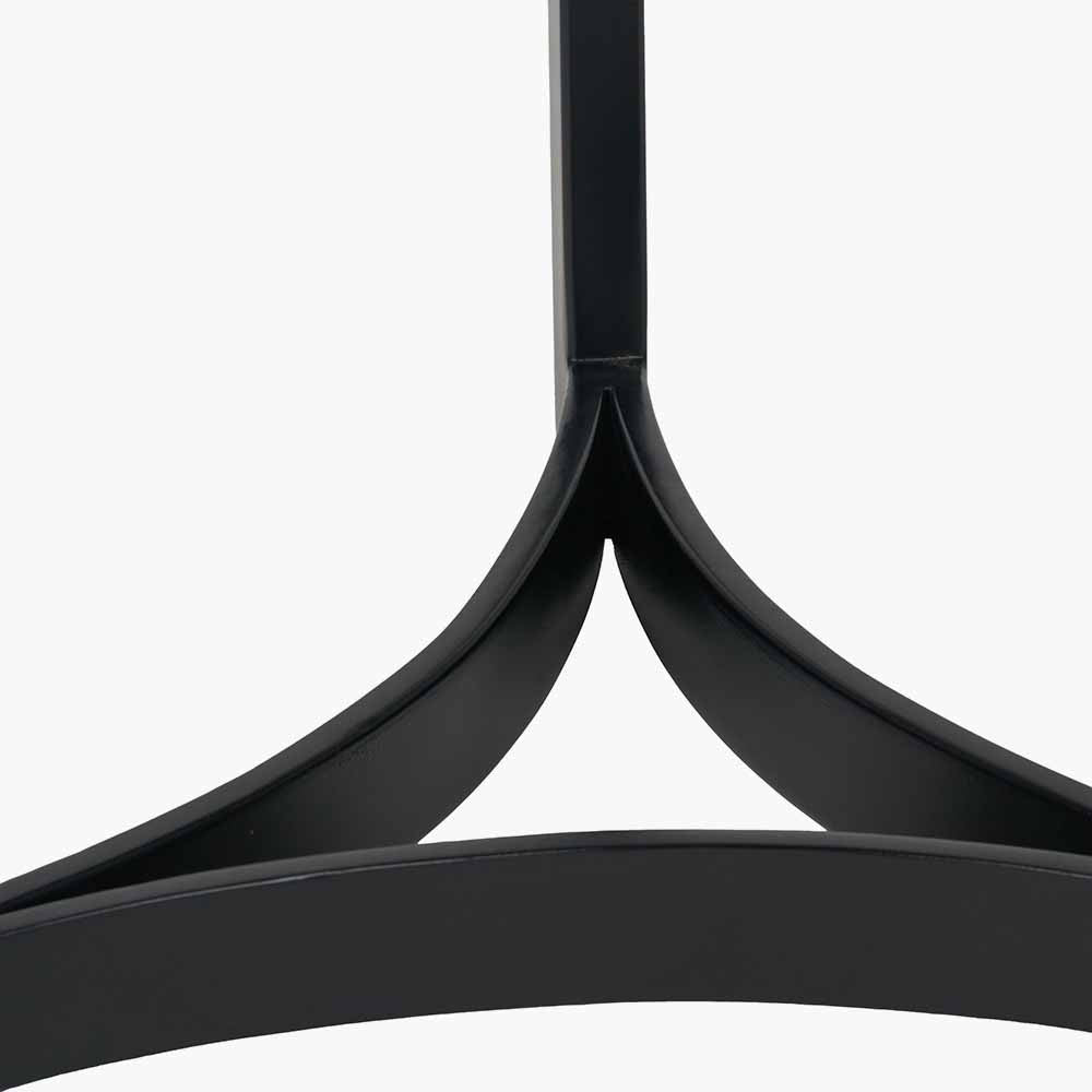 This striking Side Table pairs a luxurious marble top with gracefully curved black metal legs, creating a sophisticated contrast of texture and form. Dimensions W46xD46xH56cm. Shop online today at www.nobleandnook.co.uk