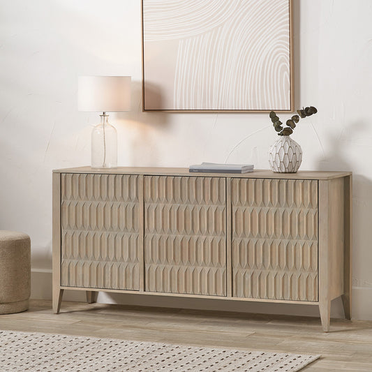 Elevate your home with the Khao 3-Door Sideboard, a beautifully crafted piece made from solid mango wood with a light grey wash finish. Shop online today at www.nobleandnook.co.uk
