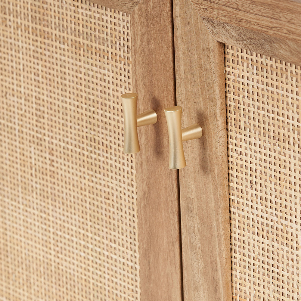 Enhance your space with the Henrik Rattan Cabinet, an elegant piece featuring a textured rattan front, adding warmth and character to any interior. Shop online today at www.nobleandnook.co.uk
