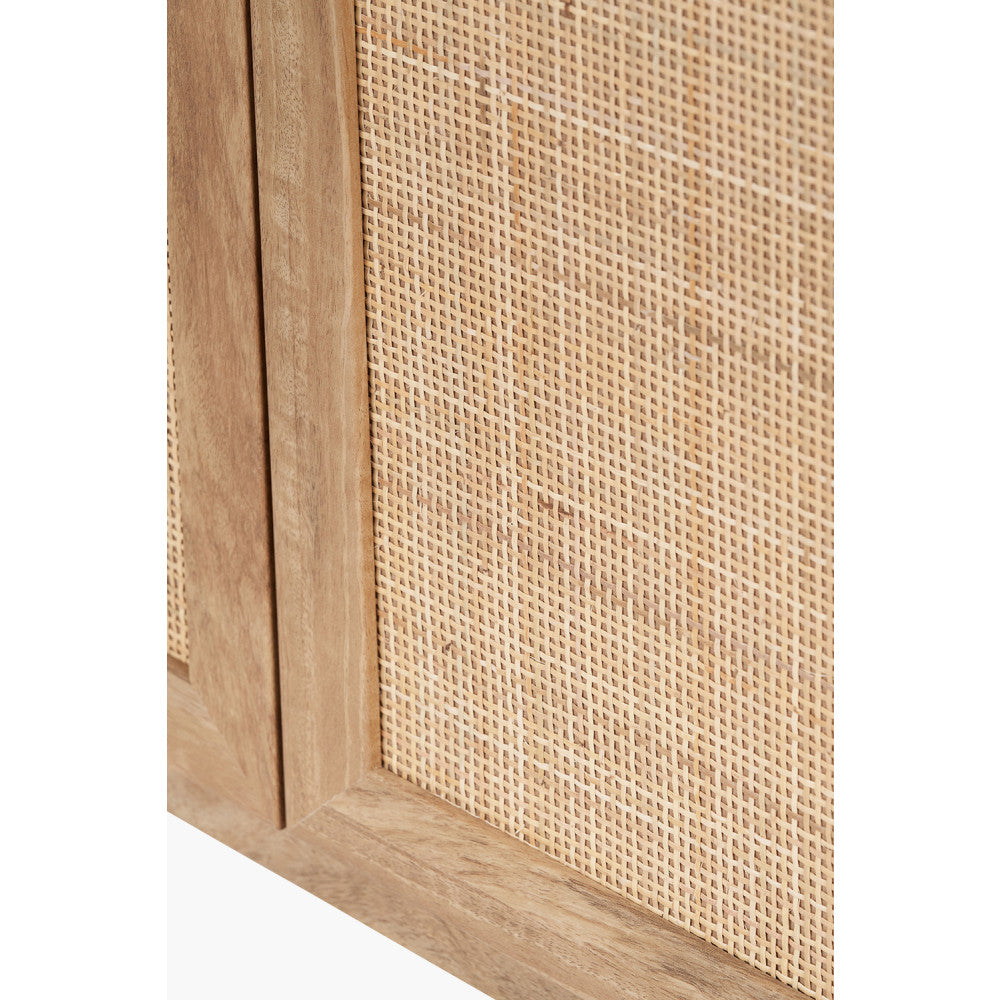 Enhance your space with the Henrik Rattan Cabinet, an elegant piece featuring a textured rattan front, adding warmth and character to any interior. Shop online today at www.nobleandnook.co.uk