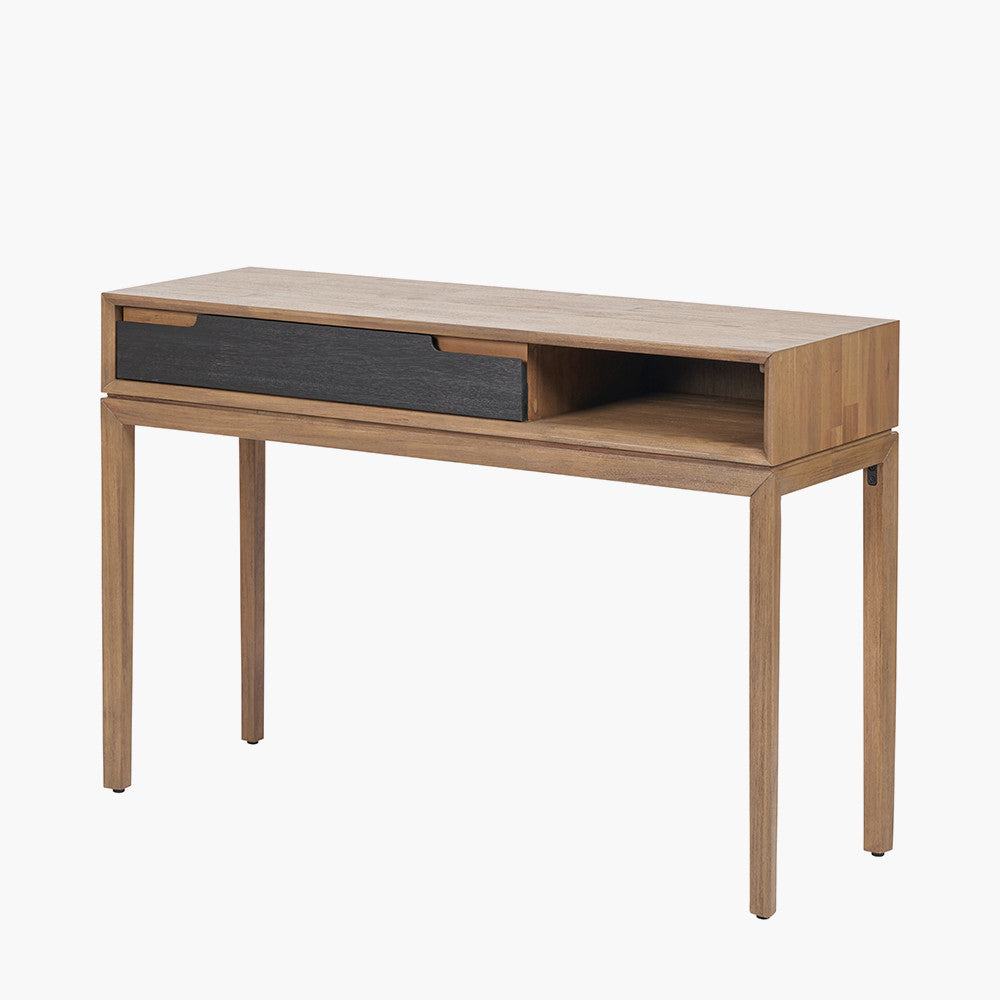 Crafted from solid acacia wood with a striking natural top and black frame, offering a bold, contemporary contrast. Scandinavian-Inspired Design. W120xD40xH80cm. www.nobleandnook.co.uk
