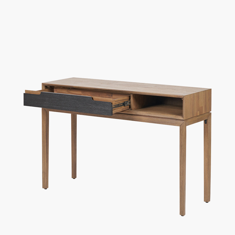 Crafted from solid acacia wood with a striking natural top and black frame, offering a bold, contemporary contrast. Scandinavian-Inspired Design. W120xD40xH80cm. www.nobleandnook.co.uk