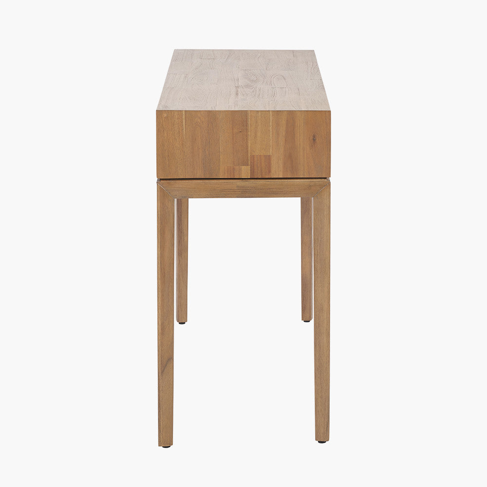 Crafted from solid acacia wood with a striking natural top and black frame, offering a bold, contemporary contrast. Scandinavian-Inspired Design. W120xD40xH80cm. www.nobleandnook.co.uk