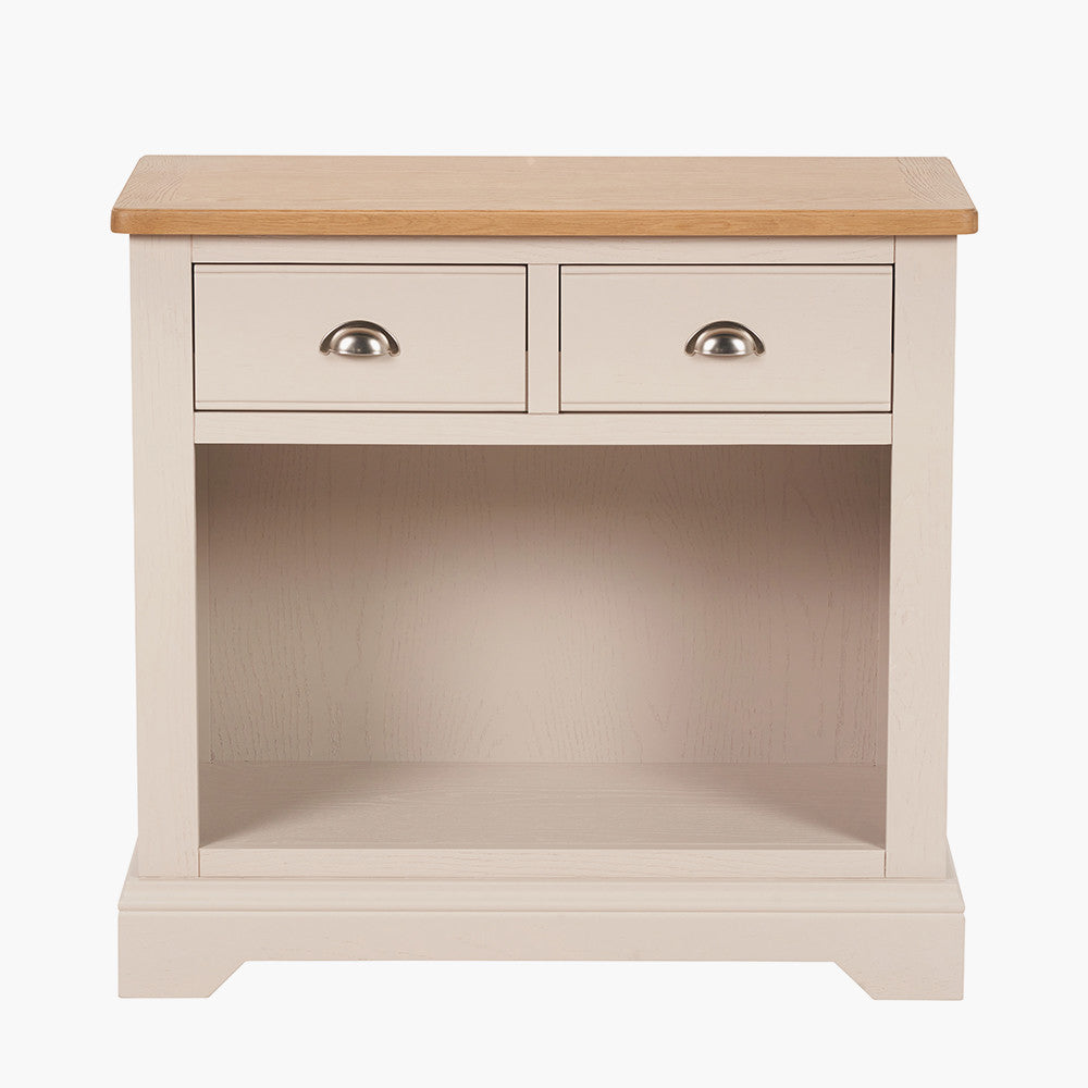 Add timeless country cottage charm to your home with the Fairford 2-Drawer Console Table. Crafted from pine wood with a parchment-white finish and oak-effect top, this elegant table offers practical storage and arrives fully assembled.