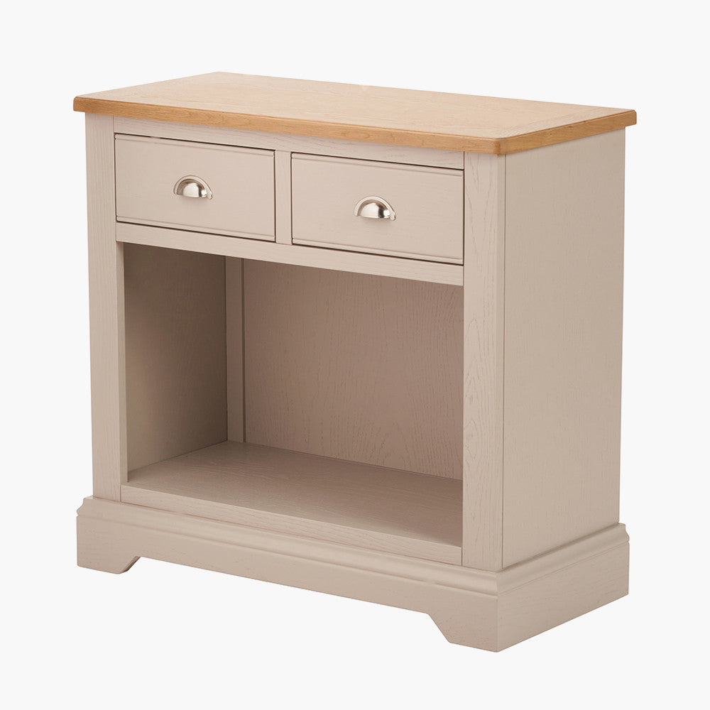 Add timeless country cottage charm to your home with the Fairford 2-Drawer Console Table. Crafted from pine wood with a parchment-white finish and oak-effect top, this elegant table offers practical storage and arrives fully assembled.