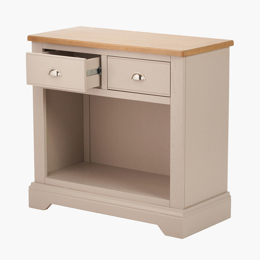 Add timeless country cottage charm to your home with the Fairford 2-Drawer Console Table. Crafted from pine wood with a parchment-white finish and oak-effect top, this elegant table offers practical storage and arrives fully assembled.