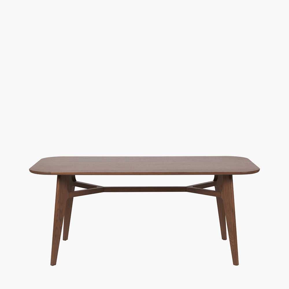 Shop the Elias Dining Table, blending minimalist elegance with Scandinavian-inspired design. Expertly crafted from solid ash wood with a stylish on-trend dark finish. Shop online today at www.nobleandnook.co.uk