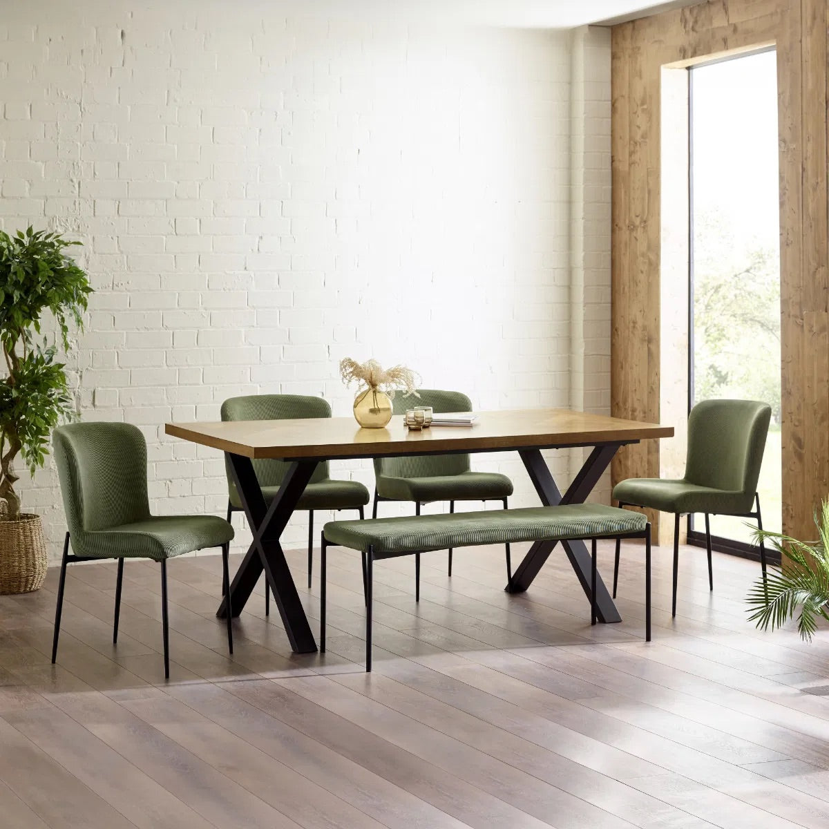Shop the Aron Dining Table with eye-catching herringbone wood top with striking black metal base ensures lasting stability. Perfect for hosting dinners or enjoying everyday meals in style. Shop online at www.nobleandnook.co.uk