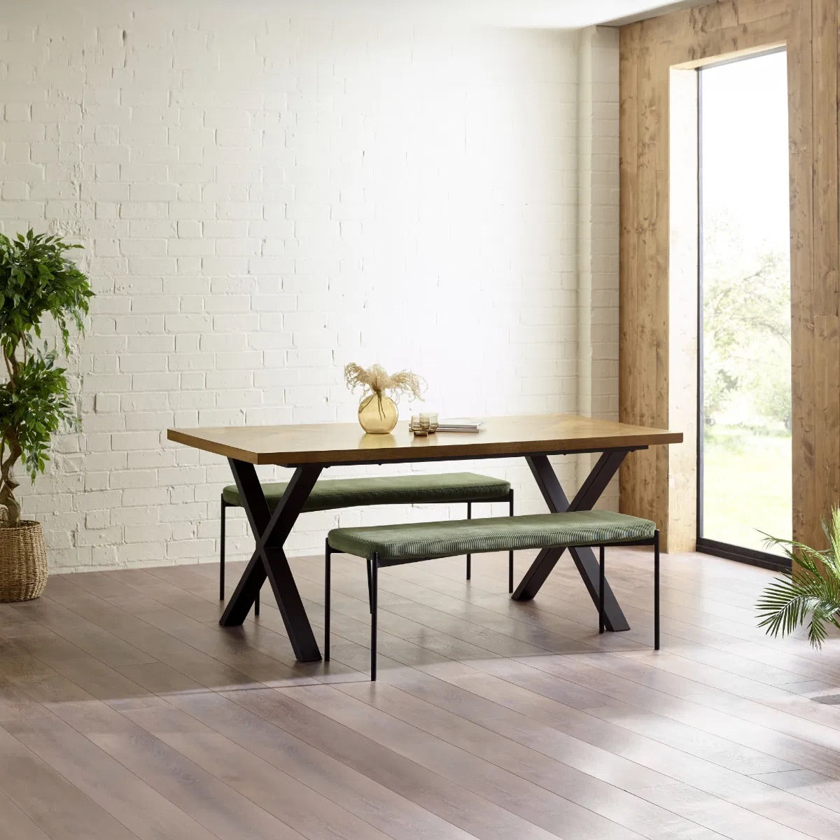Shop the Aron Dining Table with eye-catching herringbone wood top with striking black metal base ensures lasting stability. Perfect for hosting dinners or enjoying everyday meals in style. Shop online at www.nobleandnook.co.uk