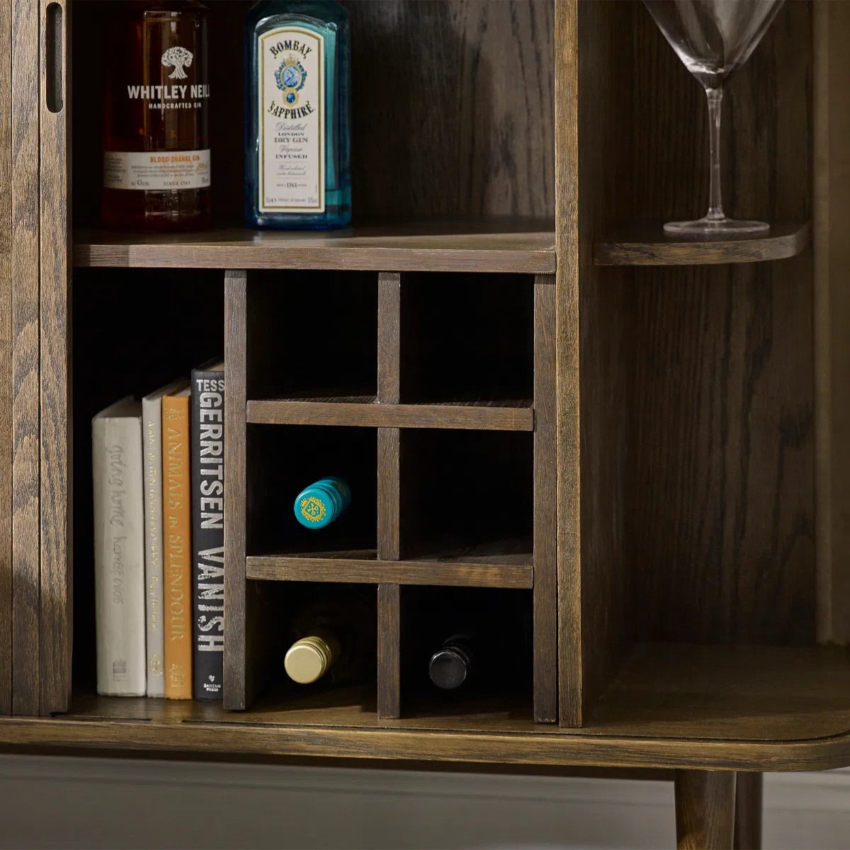 Add a touch of elegance and functionality to your entertaining space with the Arya Drinks Cabinet with sliding tambour doors reveal a well-designed interior. Available today at www.nobleandnook.co.uk