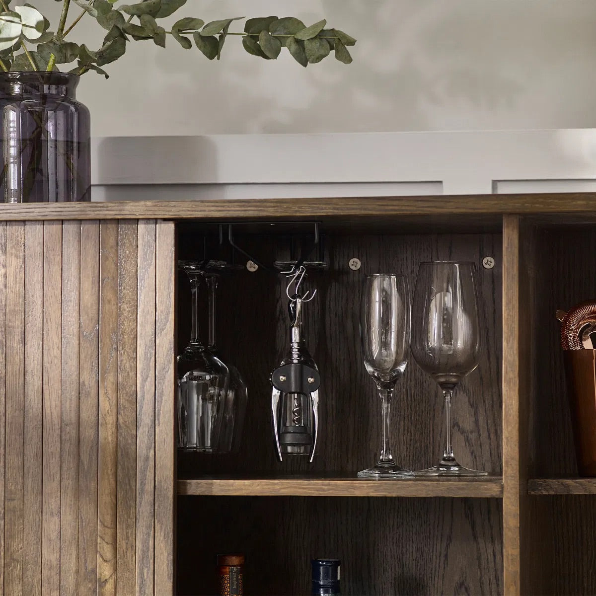 Add a touch of elegance and functionality to your entertaining space with the Arya Drinks Cabinet with sliding tambour doors reveal a well-designed interior. Available today at www.nobleandnook.co.uk