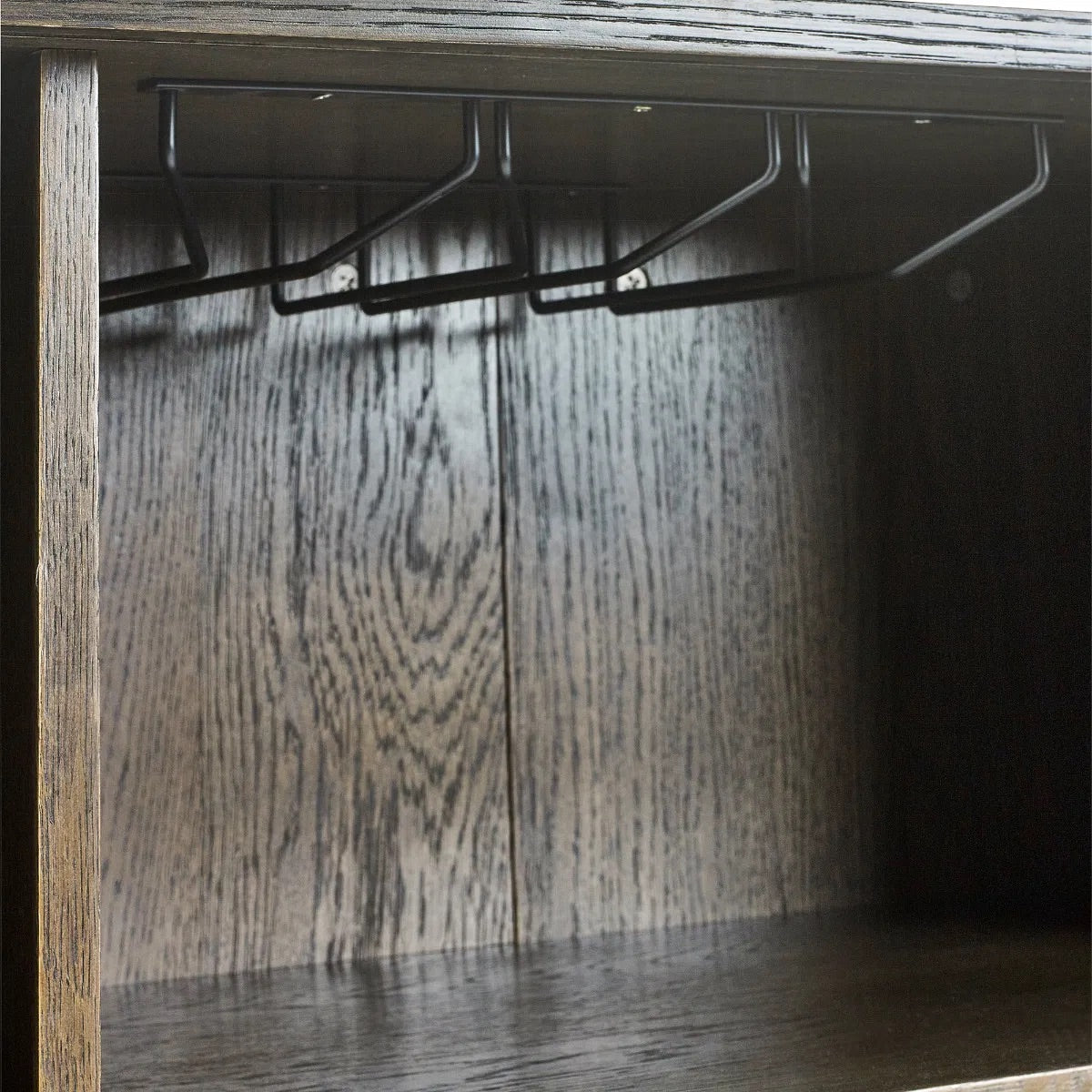 Add a touch of elegance and functionality to your entertaining space with the Arya Drinks Cabinet with sliding tambour doors reveal a well-designed interior. Available today at www.nobleandnook.co.uk