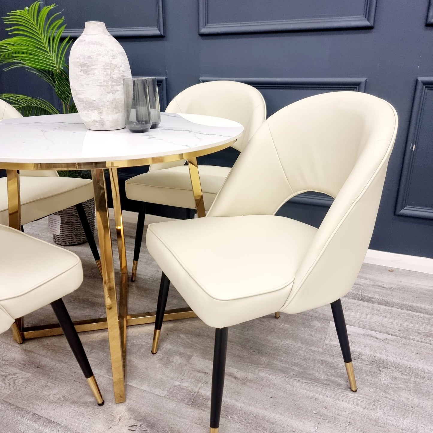 Enhance your dining space with the chic and contemporary Astra Dining Chairs, designed to deliver both comfort and style. Featuring a sleek curved open back and premium vegan upholstery. Shop online today at www.nobleandnook.co.uk