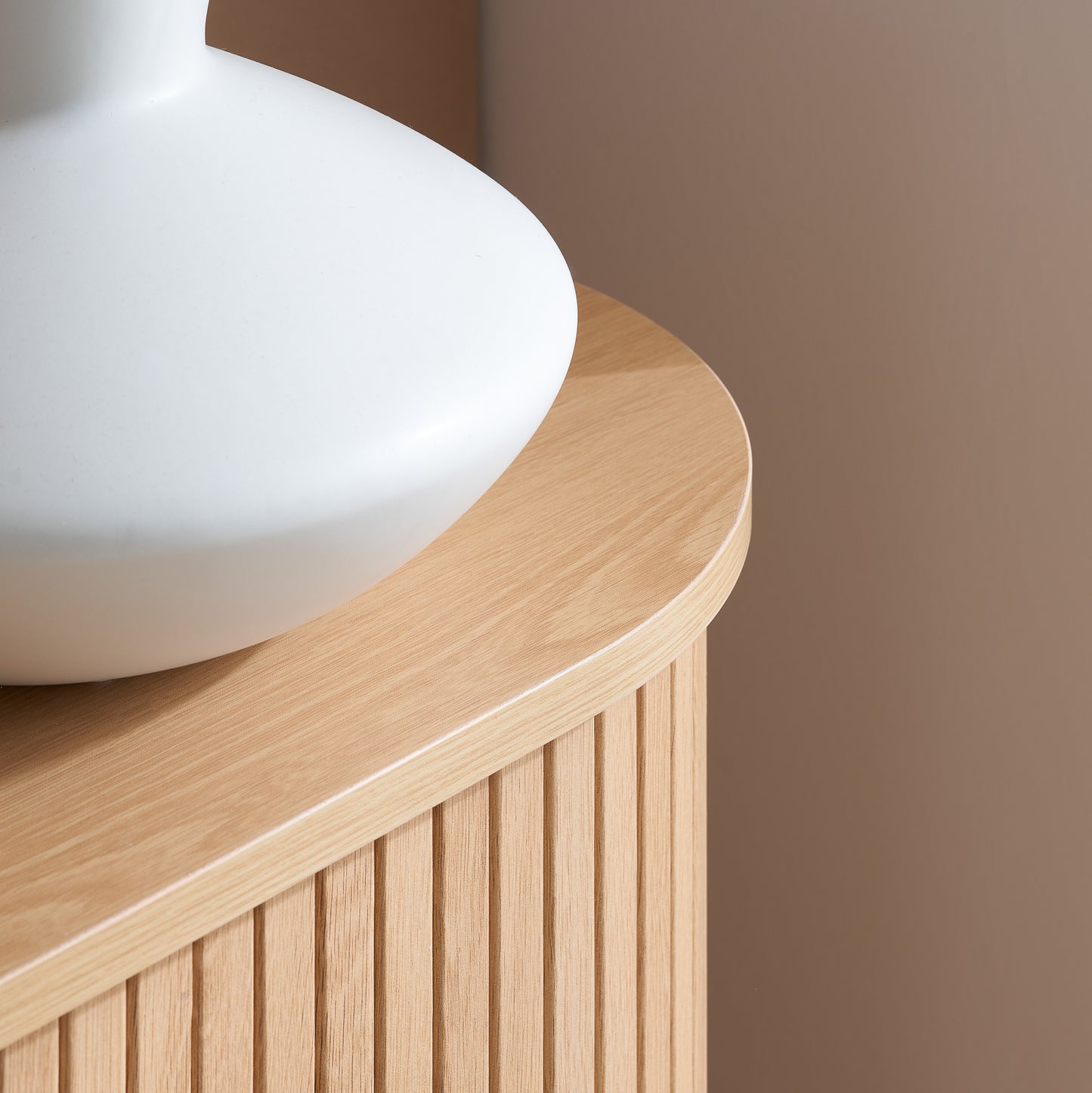 Elevate your interior with this 2 Door Fluted Sideboard, blending contemporary elegance with practical design and an oak finish adds warmth and sophistication to any room. Shop online at www.nobleandnook.co.uk