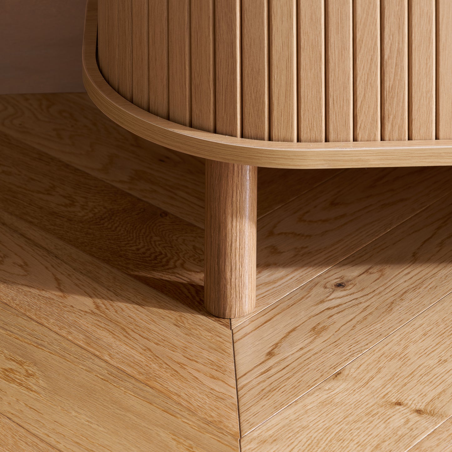 Elevate your interior with this 2 Door Fluted Sideboard, blending contemporary elegance with practical design and an oak finish adds warmth and sophistication to any room. Shop online at www.nobleandnook.co.uk