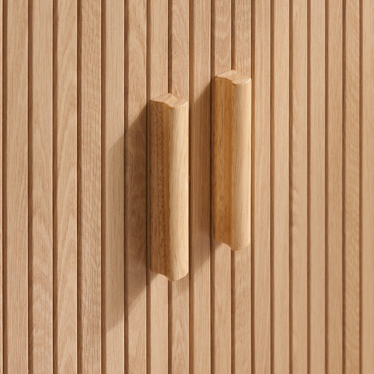 Elevate your interior with this 2 Door Fluted Sideboard, blending contemporary elegance with practical design and an oak finish adds warmth and sophistication to any room. Shop online at www.nobleandnook.co.uk
