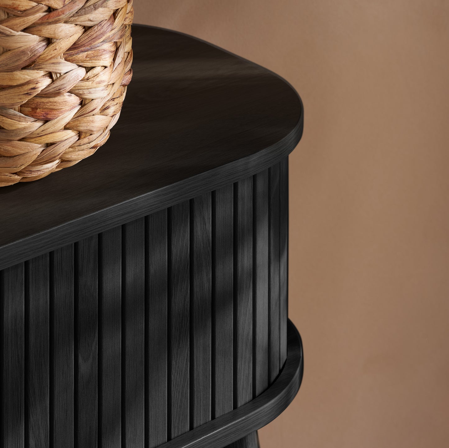 Elevate your interior with the Axel Console Table in Black. This stylish table features exquisite fluted detailing, adds depth and sophistication to any living space. Shop online today at www.nobleandnook.co.uk