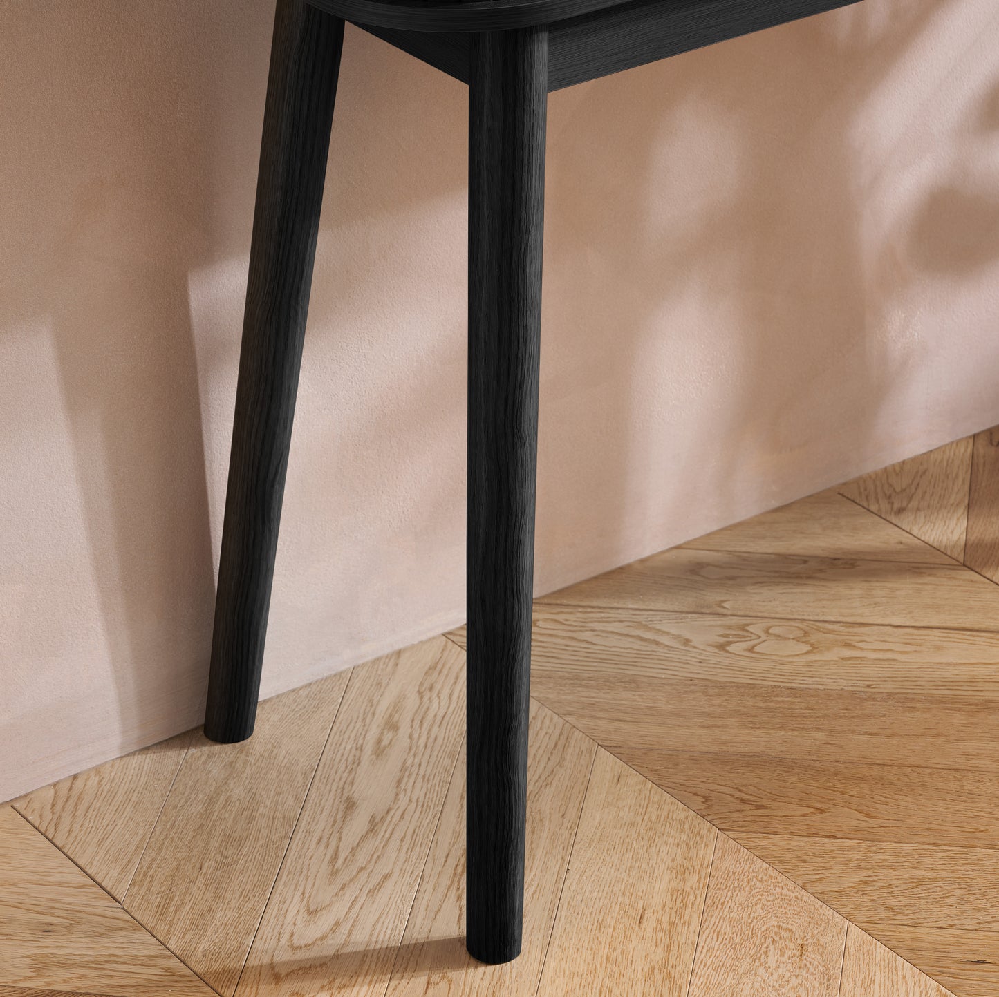 Elevate your interior with the Axel Console Table in Black. This stylish table features exquisite fluted detailing, adds depth and sophistication to any living space. Shop online today at www.nobleandnook.co.uk