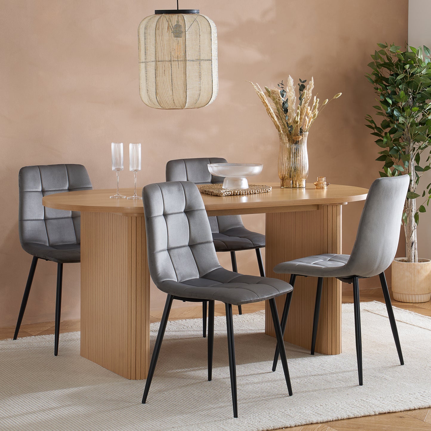 Crafted from premium MDF and available in two stylish finishes, oak or black, this oval table features beautiful fluted detailing that creates a modern, refined look. Shop online today at www.nobleandnook.co.uk