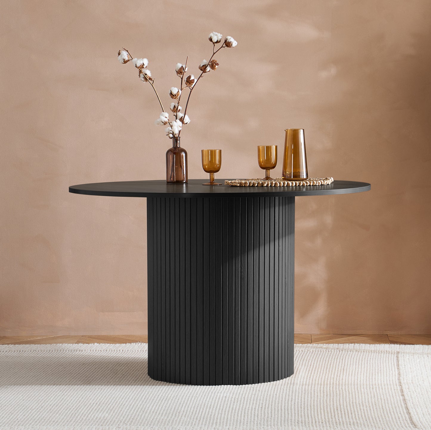 Contemporary round dining table with elegant fluted detailing, this piece adds subtle texture and modern charm to your dining space (dimensions H76xW120xD120cm) Shop online today at www.nobleandnook.co.uk