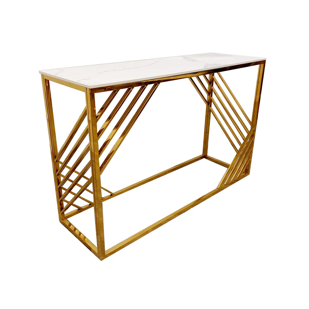 Shop now to redefine your interior design with the Azure Console Table. Featuring a gold tone frame with a Polar White Sintered Stone top. Perfectly suited for entrances and hallways. Shop online today at www.nobleandnook.co.uk