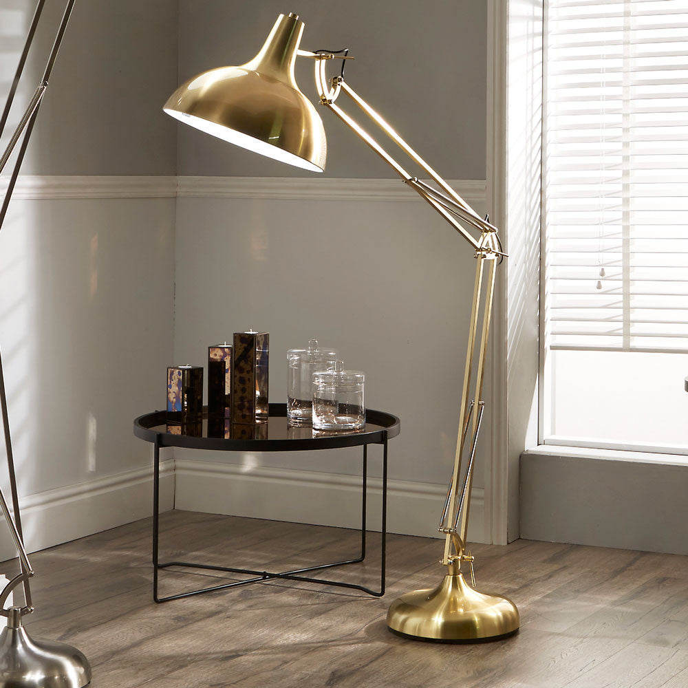 The Alonzo Brass Metal Task Floor Lamp - a sleek and contemporary design of the industrial task lamp offering an enhancement to any room. Shop online now at www.nobleandnook.co.uk