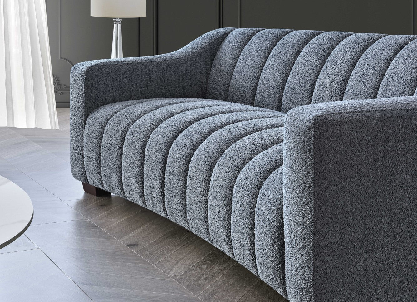 Indulge in luxury with the Astoria 3 Seater Sofa. An exquisite piece featuring deep channel stitching and adorned with a soft and alluring boucle fabric in a strong iron hue. Shop online today at www.nobleandnook.co.uk