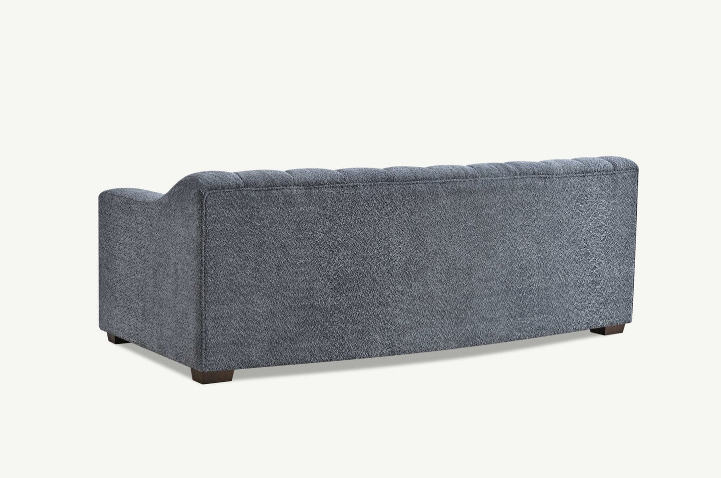 Indulge in luxury with the Astoria 3 Seater Sofa. An exquisite piece featuring deep channel stitching and adorned with a soft and alluring boucle fabric in a strong iron hue. Shop online today at www.nobleandnook.co.uk