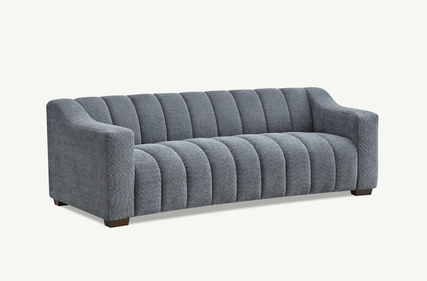 Indulge in luxury with the Astoria 3 Seater Sofa. An exquisite piece featuring deep channel stitching and adorned with a soft and alluring boucle fabric in a strong iron hue. Shop online today at www.nobleandnook.co.uk