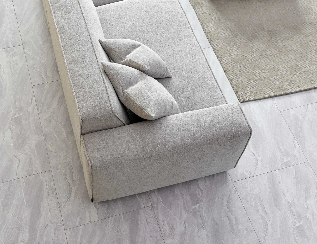 Shop the Aluxo Dakota, an exquisitely designed sofa providing unparalleled comfort and luxury with generous padding of duck feathers along the arms, seats, and back, it boasts a boxed silhouette and elegant piping detail, expertly combining modern luxury with timeless opulence. Shop online today at www.nobleandnook.co.uk SKU 10-T-SF003-DKT-G302-3A-CR