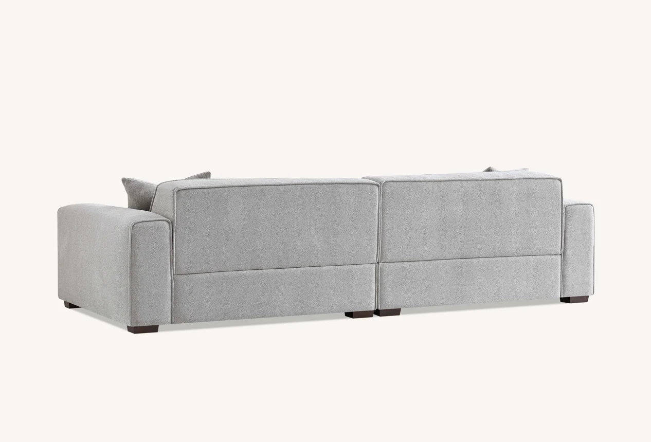 Shop the Aluxo Dakota, an exquisitely designed sofa providing unparalleled comfort and luxury with generous padding of duck feathers along the arms, seats, and back, it boasts a boxed silhouette and elegant piping detail, expertly combining modern luxury with timeless opulence. Shop online today at www.nobleandnook.co.uk SKU 10-T-SF003-DKT-G302-3A-CR