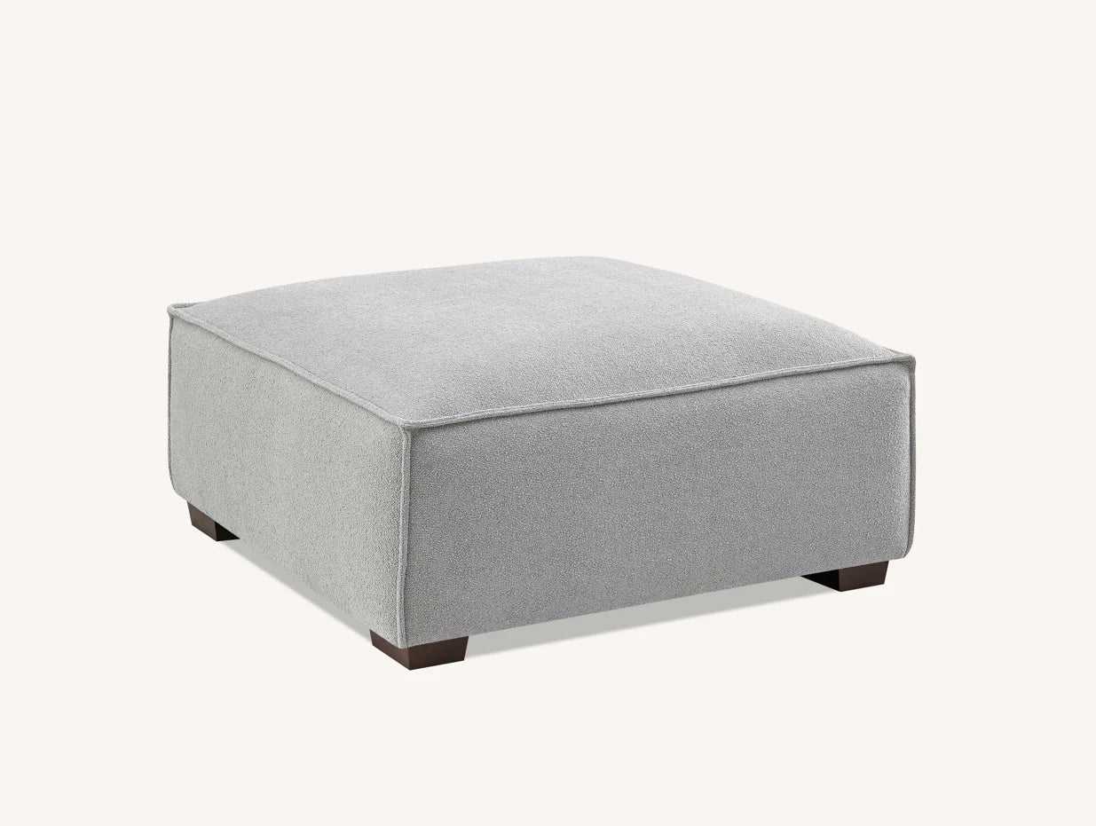 Shop the Aluxo Dakota, an exquisitely designed sofa providing unparalleled comfort and luxury with generous padding of duck feathers along the arms, seats, and back, it boasts a boxed silhouette and elegant piping detail, expertly combining modern luxury with timeless opulence. Shop online today at www.nobleandnook.co.uk SKU 10-T-SF003-DKT-G302-3A-CR