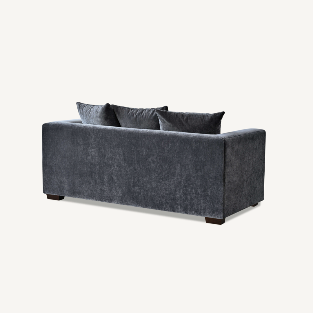 Shop the Aluxo Gramercy 2 Seater Sofa in Steel Velvet, featuring block stitched seat cushions and stunning steel-coloured mermaid boucle fabric for a modern luxury with timeless opulence. Shop online today at www.nobleandnook.co.uk