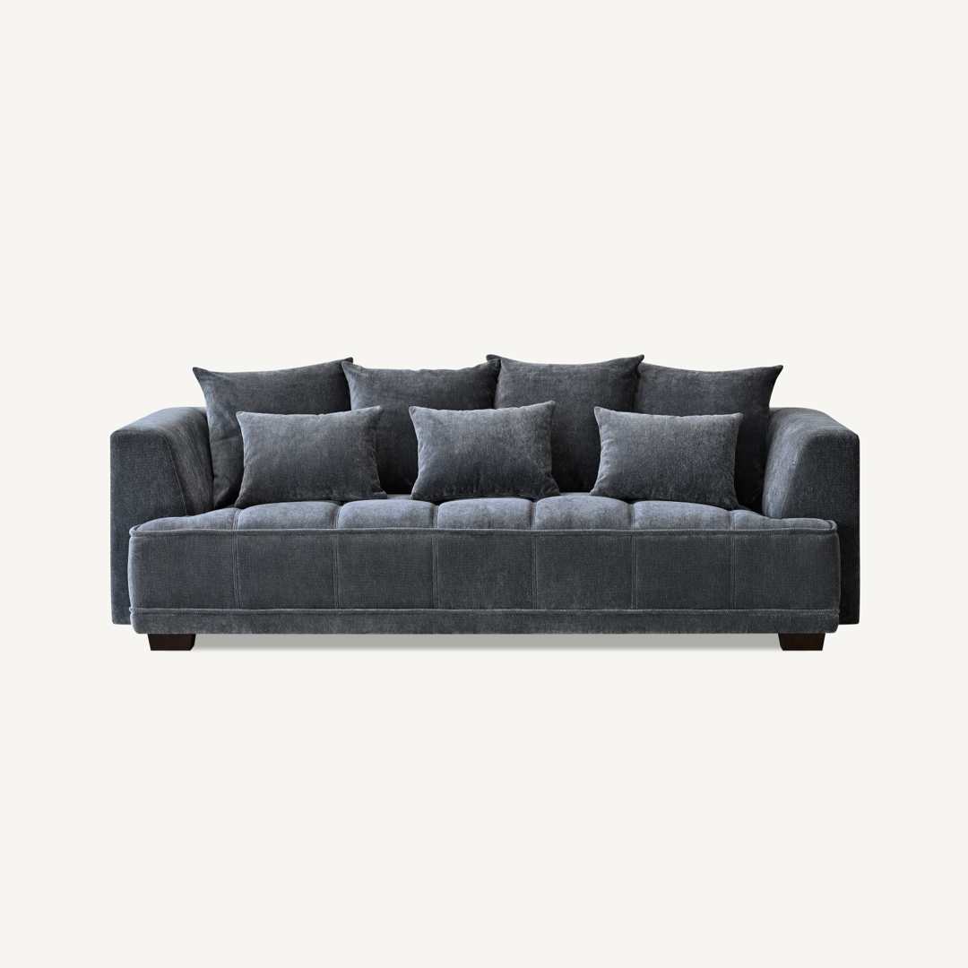 Shop the Aluxo Gramercy 3 Seater Sofa in Steel Velvet, featuring block stitched seat cushions and stunning steel-coloured mermaid boucle fabric for a modern luxury with timeless opulence. Shop online today at www.nobleandnook.co.uk