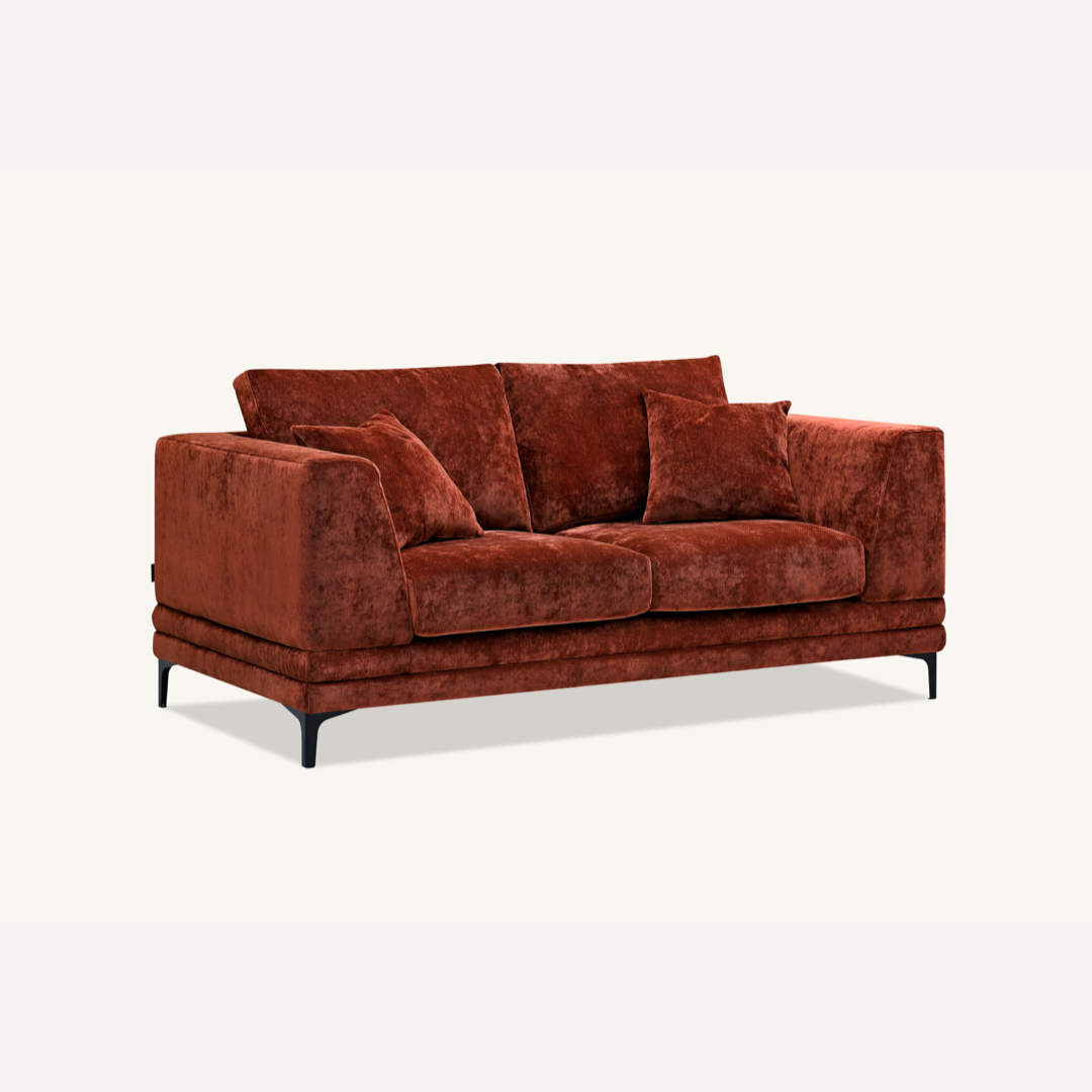 Shop the Aluxo Lenox 2 and 3 Seater Sofas in Rust Velvet, timeless mid-century modern sofas with deep sumptuous cushions for you to sink into and relax. Crafted with a solid wooden frame and high-density foam padding. Shop online today at www.nobleandnook.co.uk