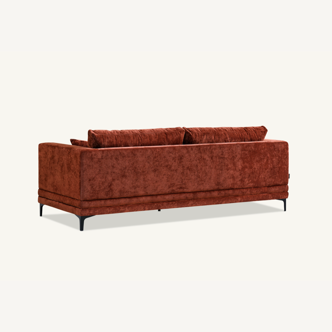Shop the Aluxo Lenox 3 Seater Sofa in Rust Velvet, a timeless mid-century modern sofa that combines sleek lines and minimalist design with deep, sumptuous cushions for the utmost comfort. Crafted with a solid wooden frame and high-density foam padding. Shop online today at www.nobleandnook.co.uk