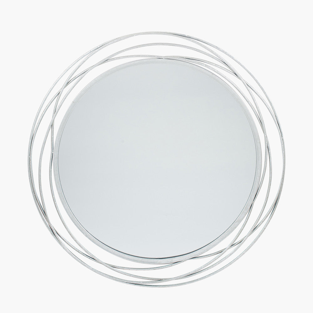 Featuring delicate swirling metalwork finished in a stunning antique silver, this mirror brings light, depth, and elegance to your space. Shop online now at www.nobleandnook.co.uk