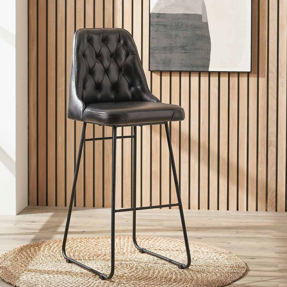 Shop the Ash Black Leather Diamond Back Bar Stool, the perfect addition to any breakfast bar or kitchen island. FREE UK MAINLAND DELIVERY. Shop online now at www.nobleandnook.co.uk